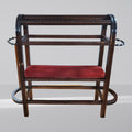 Perchero burro de madera estilo castellano con paragüero y asiento rojo, diseño clásico para hogar o jardín.