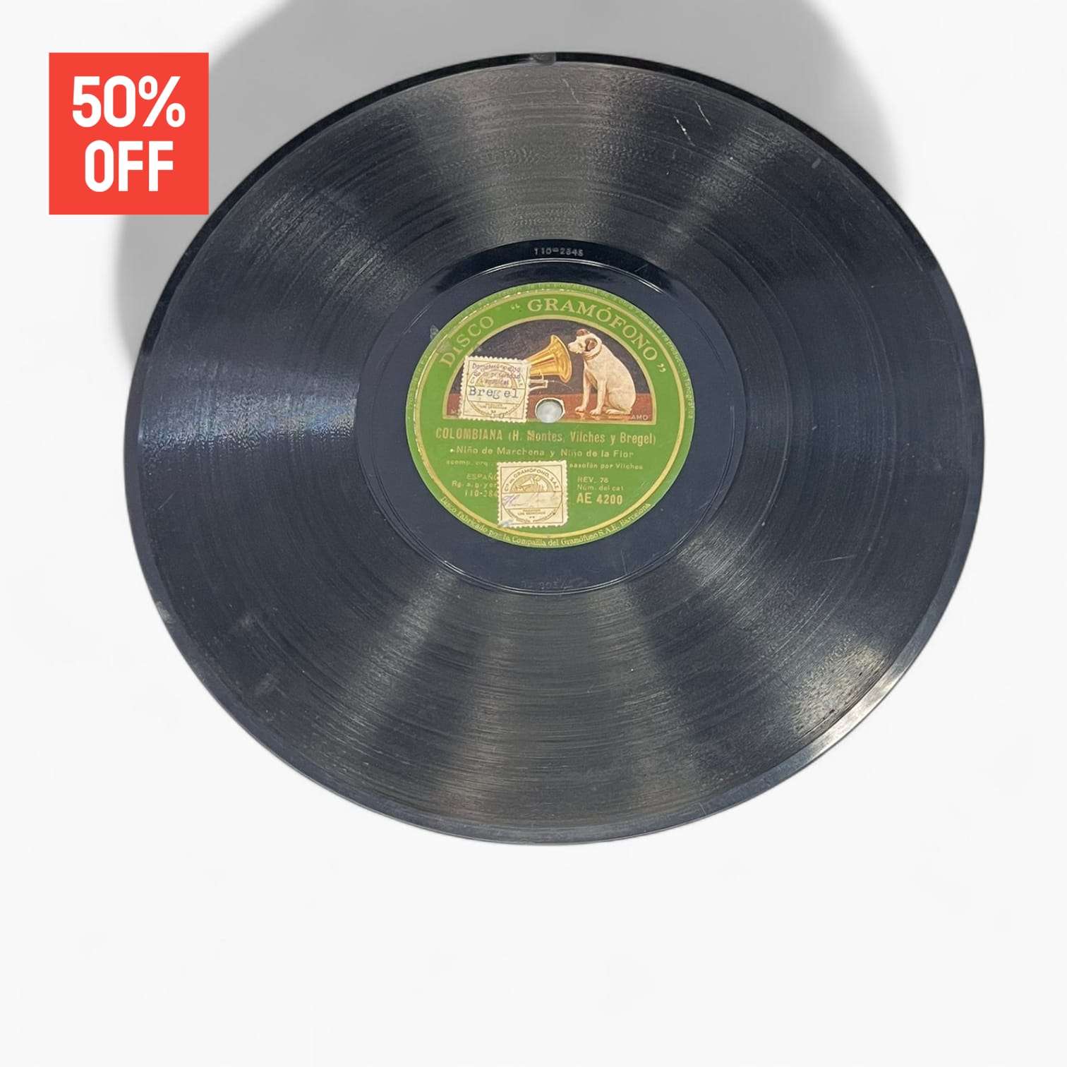Disco de pizarra antiguo con etiqueta verde Gramófono, Colombia de Montes, ideal para decoración de estilo retro musical.