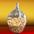 DamaJuana Antigua Cristal - DamaJuana decorativa artesanal llena de corchos, ideal para decoración rústica en hogar o espacios vinícolas.