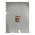 Sello en la base del Juego de Té Macao indicando su fabricación en Macao. Autenticidad y calidad en porcelana de edición limitada.