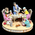 Grupo de porcelana representando una escena familiar durante el desayuno, obra de arte francesa del siglo XX con detalles elegantes. Envío gratis.