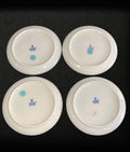 Parte trasera del conjunto Platos Lladro 1993 con sello original y numeración. Cerámica de colección ideal para decoración exclusiva.