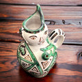 Botijo Cachirulo artesanal con detalles pintados a mano y forma única. Ideal para decorar espacios con un toque tradicional y auténtico.