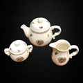 Set de tetera, azucarero y jarra San Claudio con motivos de flores y frutas. Decoración clásica para el hogar con calidad única.