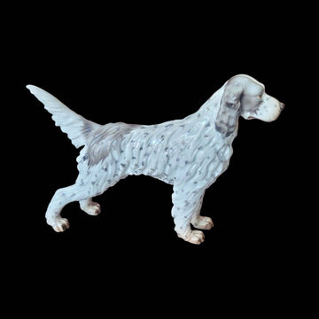 Figura de Setter Irlandés en porcelana Martinu, pieza única con acabado brillante y detalles realistas en pelaje moteado, ideal para decoración.