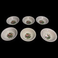 Lote de cuencos Pontesa de porcelana española vintage con diseño floral y frutas. Conjunto de seis piezas decorativas para mesa o colección.