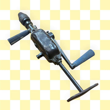 Berbiquí antiguo taladro manual mecánico