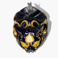 Gato de loza decorativa con tapa y escupidera, diseño en azul y dorado