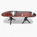 Mesa comedor de caoba clásica con doble pedestal