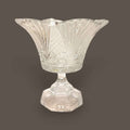 
Su diseño transparente permite que la luz atraviese el cristal y resalte cada talla. Uma peça decorativa com brilho próprio, ideal para comprador