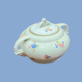 Vista superior lateral del azucarero de porcelana Victoria con tapa decorativa y motivos florales, perfecto para coleccionistas de decoración.