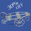 Carro portabotellas de cobre con diseño vintage elegante, ideal para decoración de interiores, disponible con 30% de descuento.