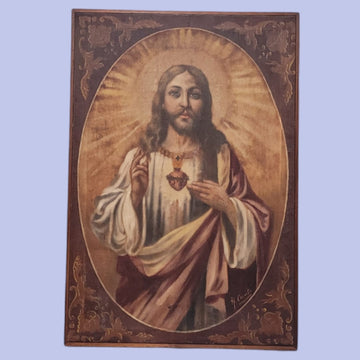 Pintura del Sagrado Corazón de Jesús en óleo sobre tela con detalles dorados y fondo ovalado, ideal para decoración religiosa.