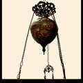 Sistema superior de anclaje con pieza decorativa calada
