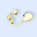 Maquinilla de afeitar eléctrica PHILISHAVE de PHILIPS en color crema con enchufe europeo y diseño clásico, pieza de colección.