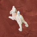 Vista trasera de la figura Cocker Spaniel biscuit firmada por C. Martinus, mostrando detalles realistas del pelaje en porcelana sin esmaltar.