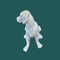 Vista superior de la figura perro NAO Lladró - Porcelana Cachorro Sentado, mostrando detalles anatómicos realistas y acabado esmaltado.