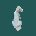 Vista aérea de la figura perro NAO Lladró - Porcelana Cachorro Sentado, ideal para decoración elegante en hogar o vitrina de colección.