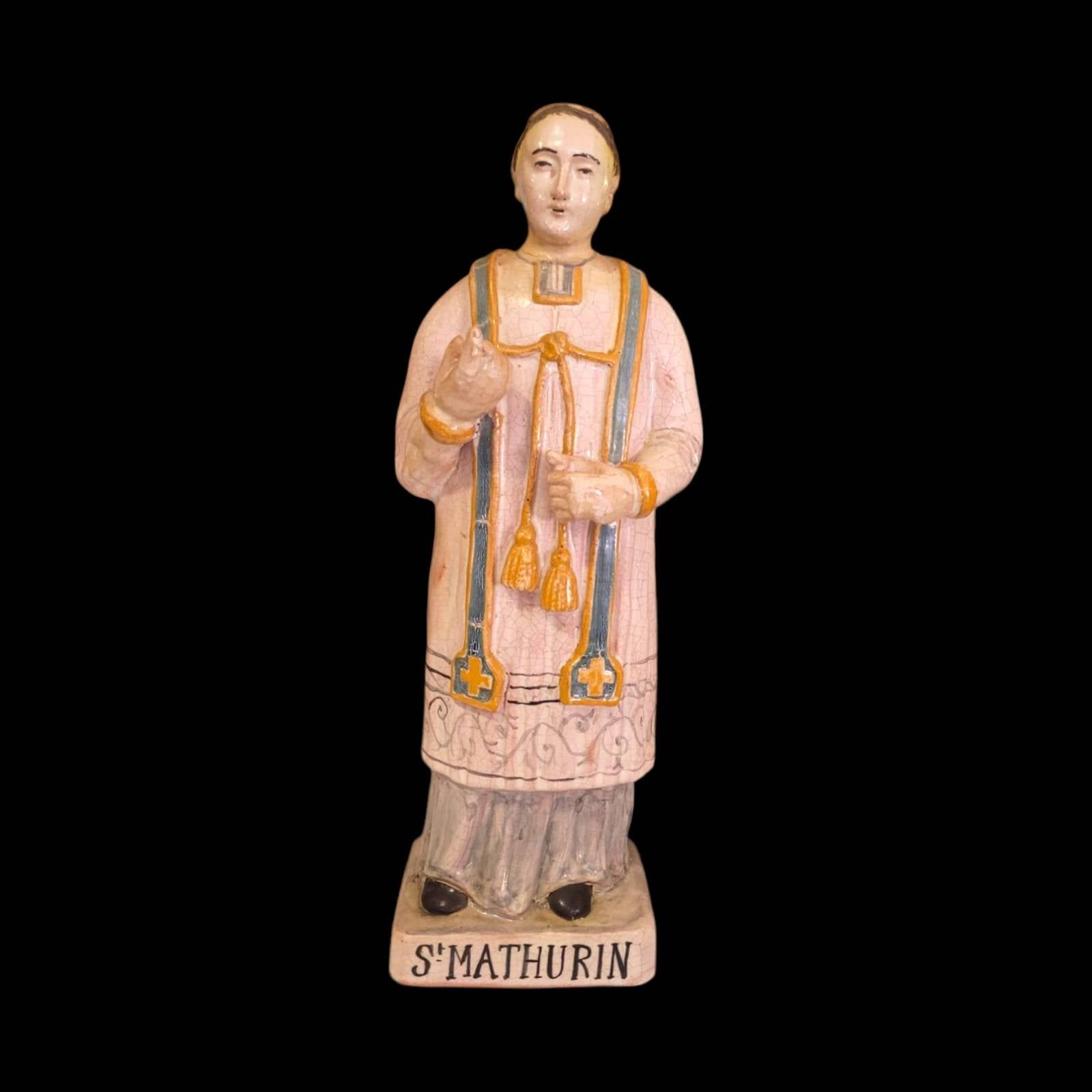 Figura de San Mathurin en terracota pintada a mano, ideal para decoración religiosa en el hogar. Pieza artesanal de arte y devoción cristiana.