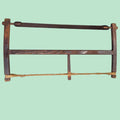 Vista frontal de sierra de arco manual antigua de madera, pieza decorativa única para coleccionistas y entornos vintage en Home & Garden > Decor.
