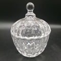 Tarro de cristal tallado con tapa, diseño vintage y elegante ideal para decoración del hogar. Perfecto para almacenar con estilo en cocina o sala.