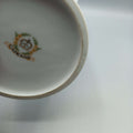 Base del jarrón de porcelana Capeans con sello distintivo, ideal para decoración elegante y duradera en el hogar.