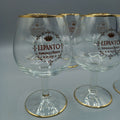 Copas Lepanto de González Byass - Elegancia y Tradición en Cristalería, set de seis copas de brandy en cristal con borde dorado, ideales para decoración.