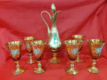 Botella de licor Murano con 6 copas exquisitas, pintadas a mano en cristal dorado con detalles florales, decoración vintage elegante.