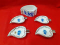Juego completo de ceniceros de porcelana con decoración floral azul y detalles en hilo de plata, ideal para decoración elegante del hogar.