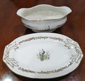 Salsera Pickman con bandeja de porcelana, diseño elegante y clásico con detalles dorados y motivo de pavo real, ideal para decoración vintage.