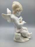 Figura Lladró Ángel con laúd vista desde el lado derecho, mostrando postura sentada y detalles en porcelana, diseño de 1987.