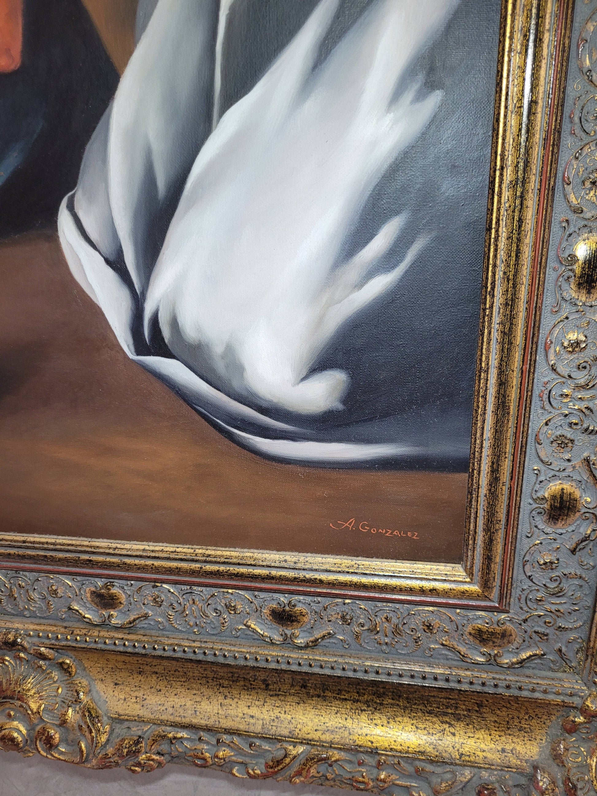 Firma de A. González en la reproducción del óleo 'La Sagrada Familia' de Zurbarán. Pintura decorativa con marco elegante y detalles refinados.