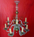 Lámpara de cristal antigua de alta calidad, vintage, con brazos curvos y detalles dorados, ideal para decoración elegante en el hogar.