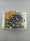 Jarrón de porcelana pintado con detalle floral, calidad superior, con flores multicolores en relieve sobre la tapa, ideal para decoración vintage.