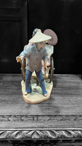 Figura decorativa Lladró Paseo en China, porcelana con geisha y rickshaw. Pieza de colección para amantes del arte oriental. Envío gratis.