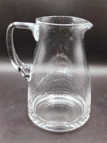 Jarra Transparente de cristal Elegante – Antigüedad de Calidad con diseño clásico curvado, ideal para decoración de mesa en estilo vintage.