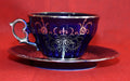 Taza de porcelana azul cobalto con detalles en hilo de plata, parte del Juego de Café Azul Cobalto con Hilo de Plata - Elegancia Clásica. Ideal para decoración elegante en Home & Garden > Decor.